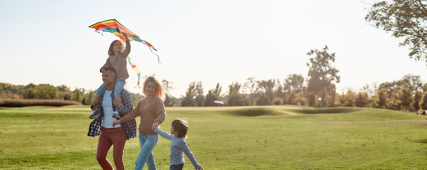 family flying a kite
